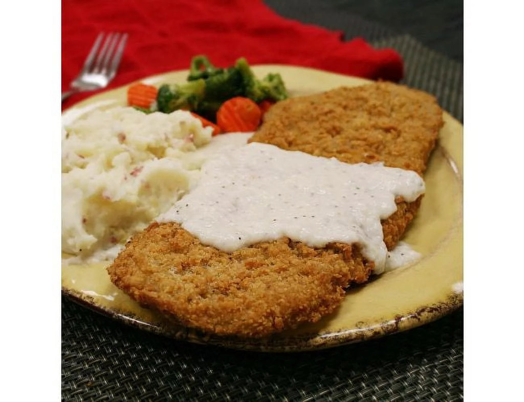 11 Ounce Raw Chicken Fried Steak - 15 per case I702